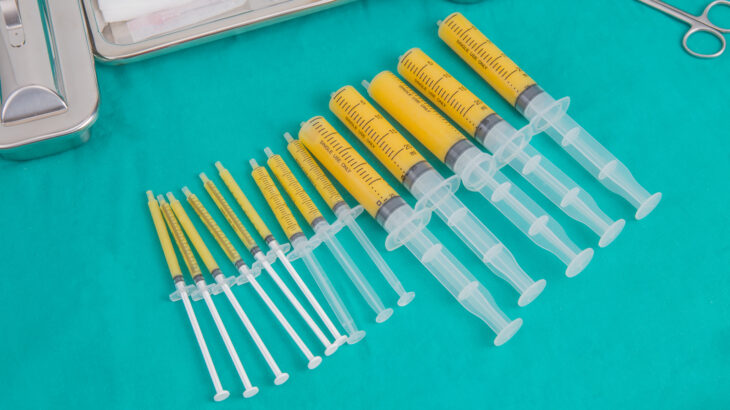 Syringes,Of,Fat,For,Fat,Grafing,On,Steriled,Green,Fabric